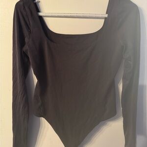 Lululemon Bodysuit. Black size Medium.